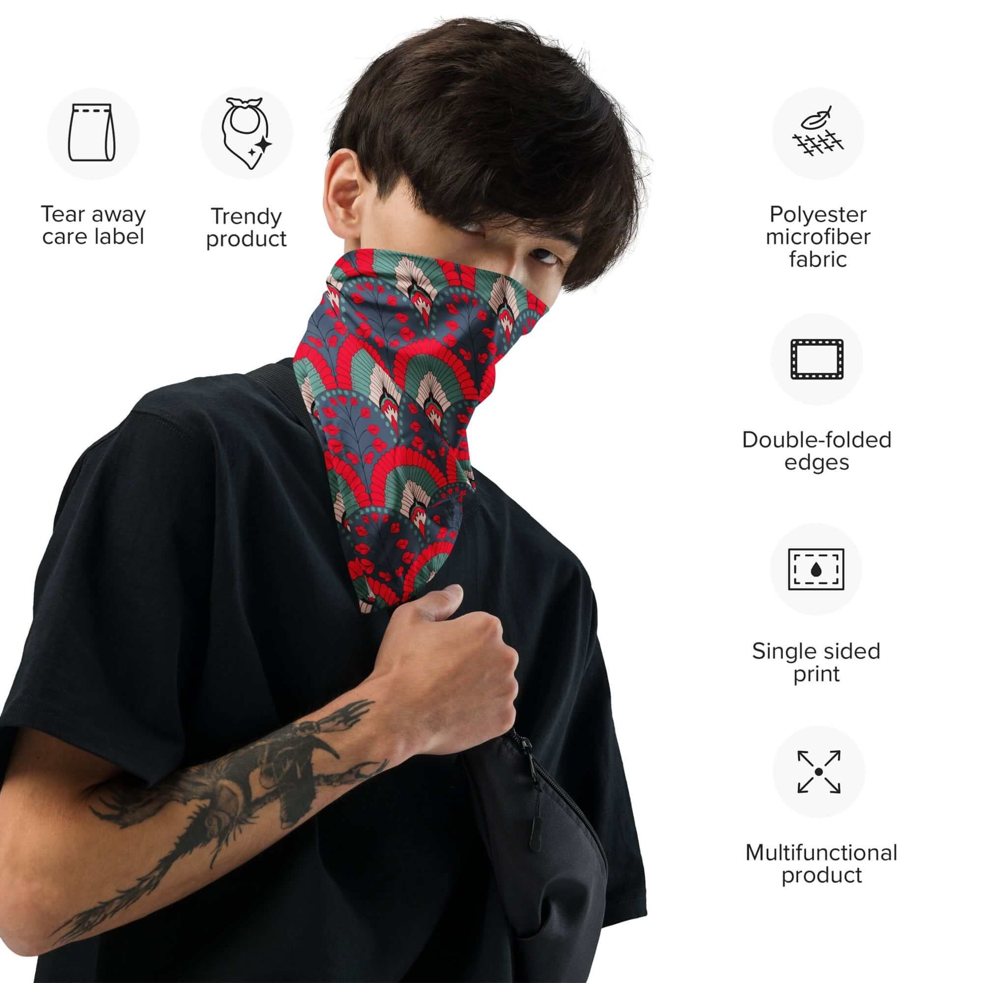 Person wearing a colorful scallop pattern red navy bandana scarf with product features listed on the side.