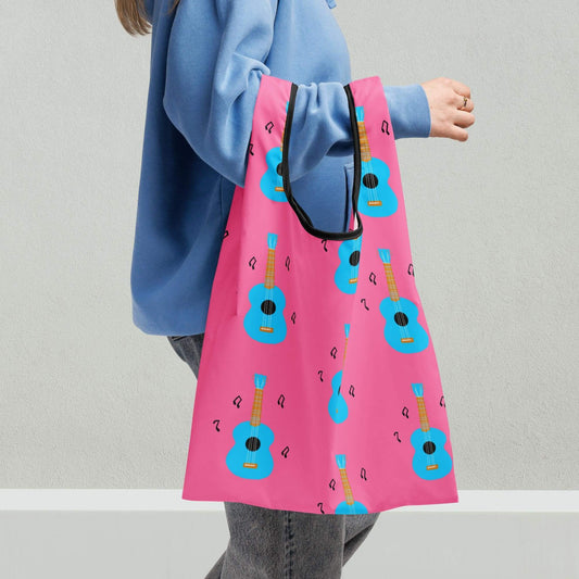 women holding a pink reusable grocery shopping bag
