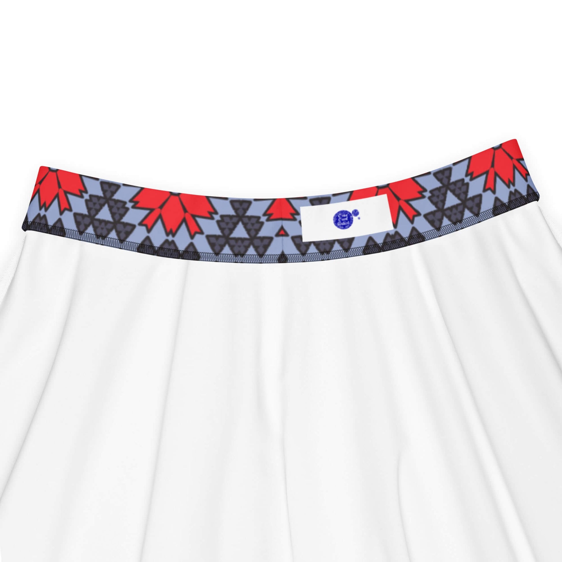 red floral skater skirt with a colorful waistband featuring one owl artist logo