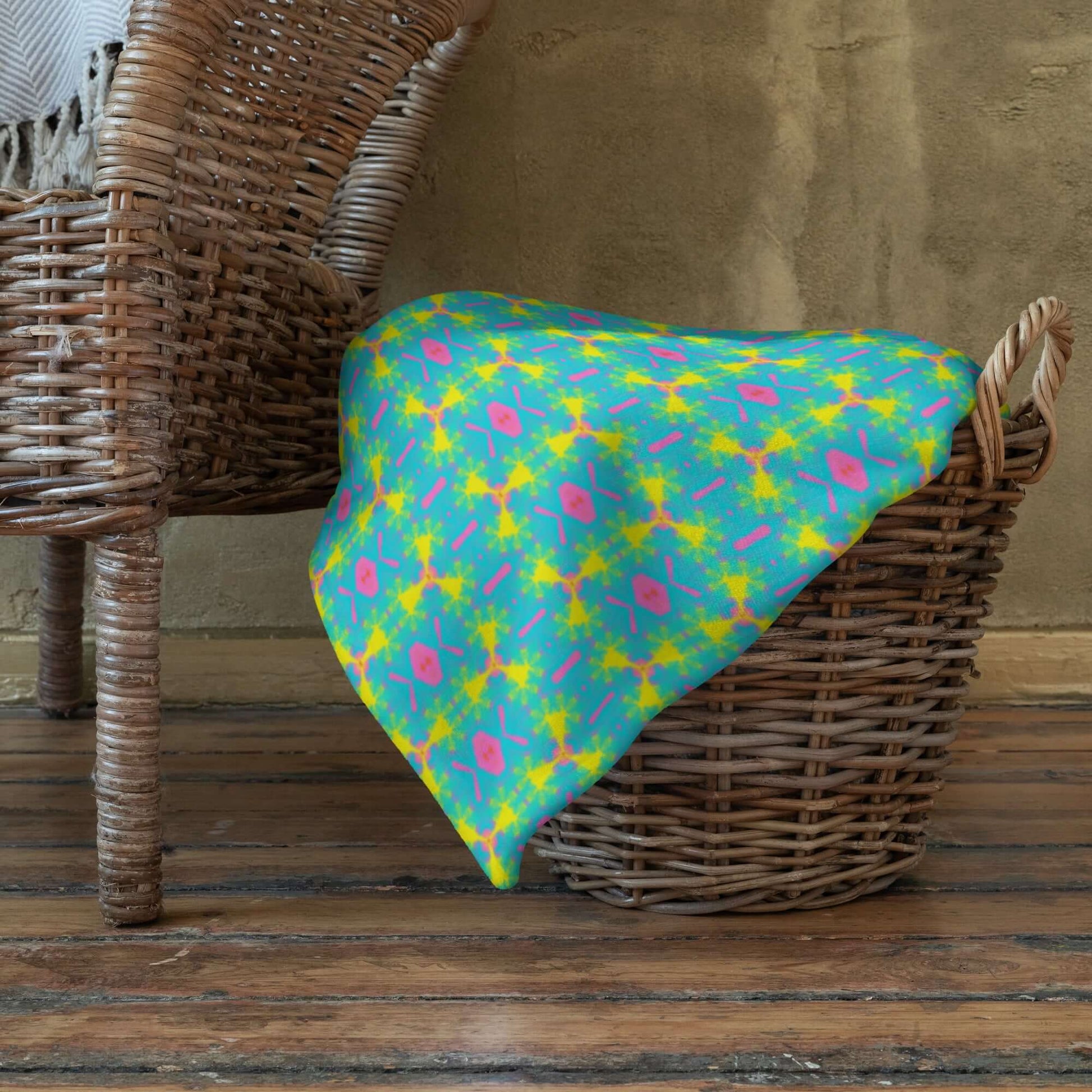 aqua throw blanket on a basket