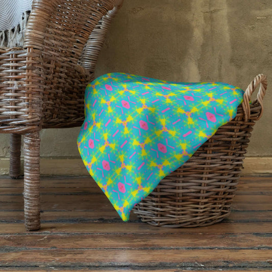 aqua throw blanket on a basket