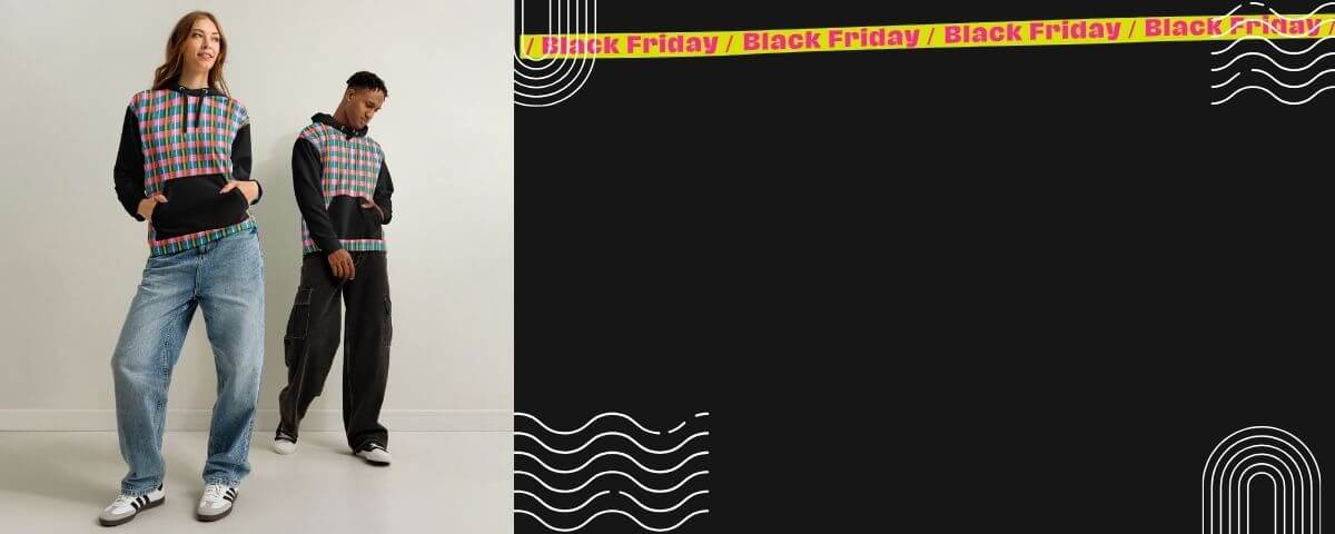 Two people wearing plaid jackets with a Black Friday sale banner 2025