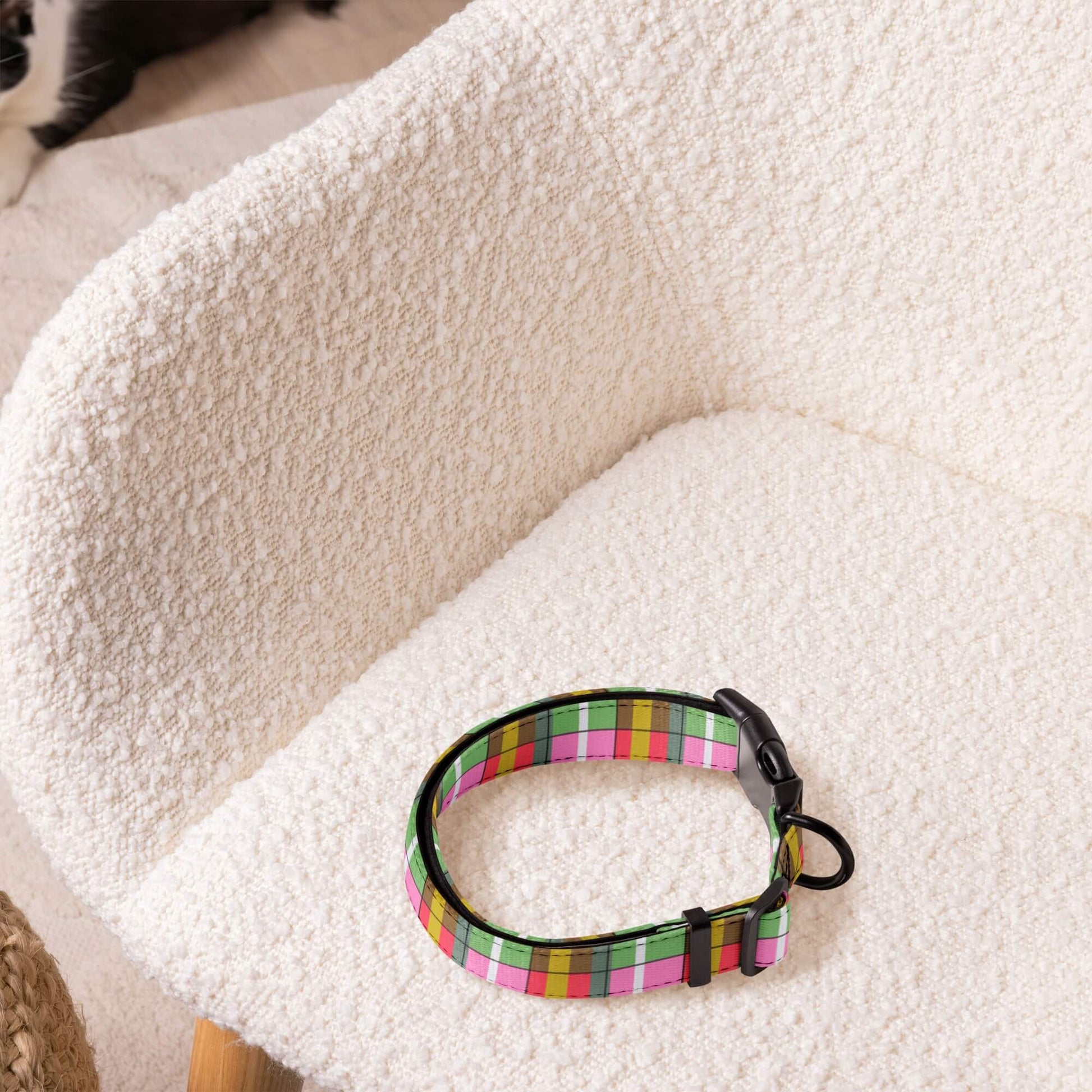 Cute plaid dog collars on a white cushion