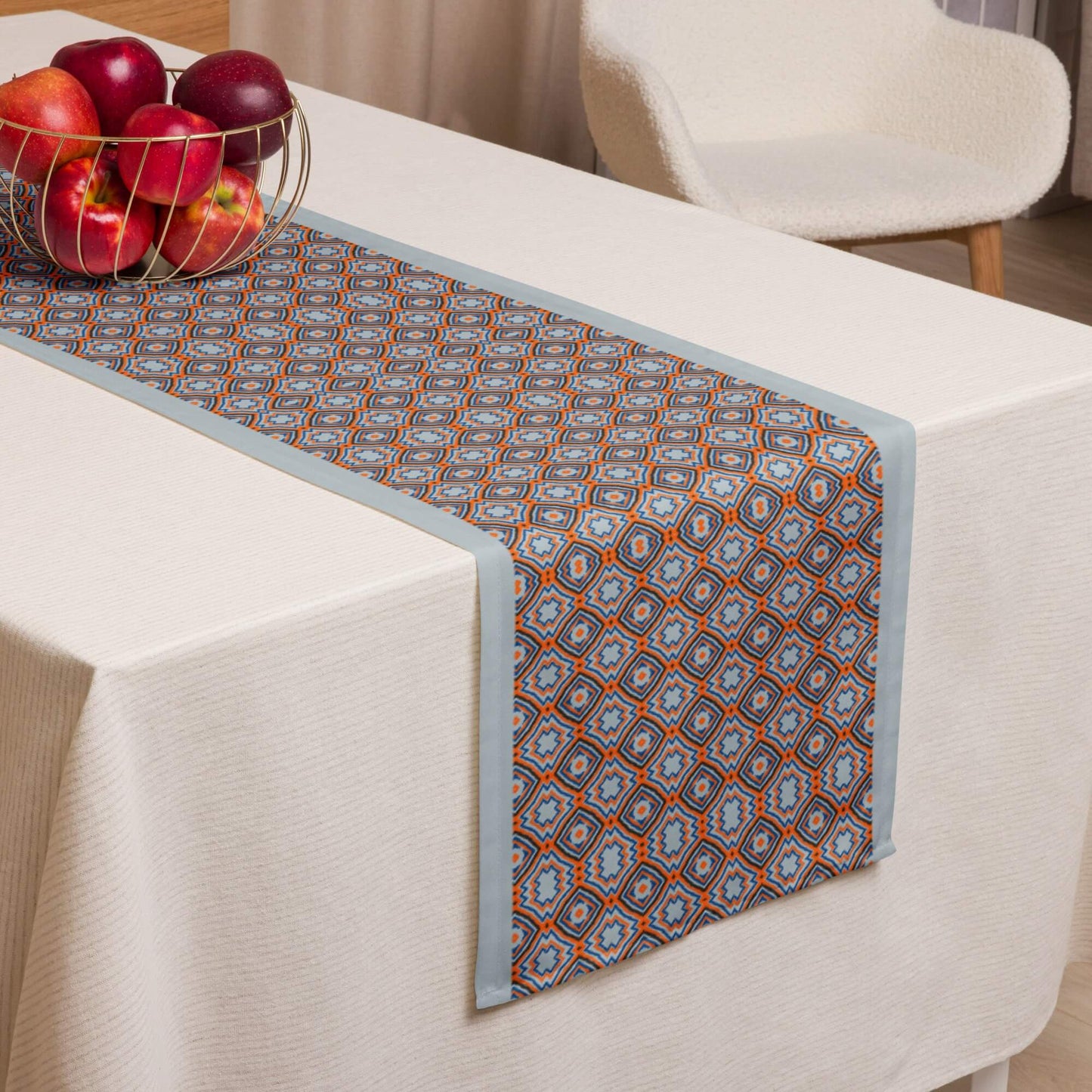 Spring table runner with dusty blue and orange pattern design