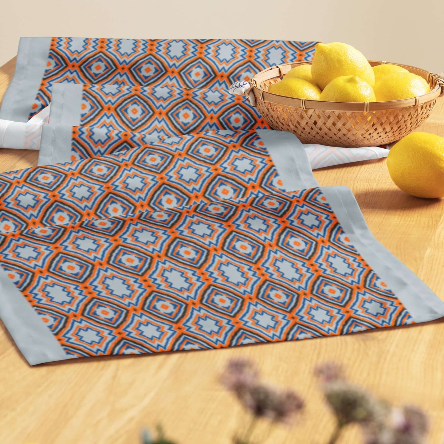 Gold table runner with a basket of lemons