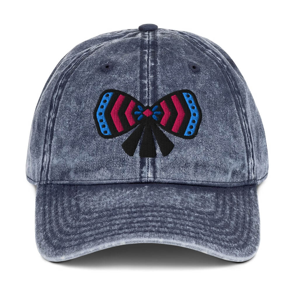 Navy blue cotton twill cap with a colorful ribbon bow embroidery on front