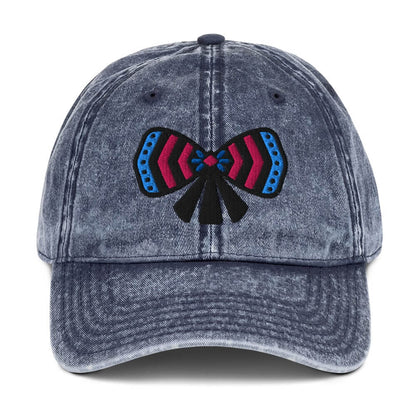 Navy blue cotton twill cap with a colorful ribbon bow embroidery on front