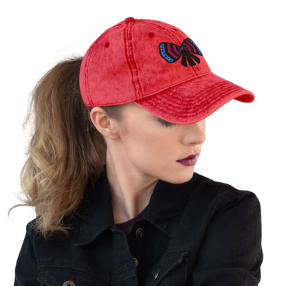 women's red cotton twill cap with a ribbon bow embroidery on front